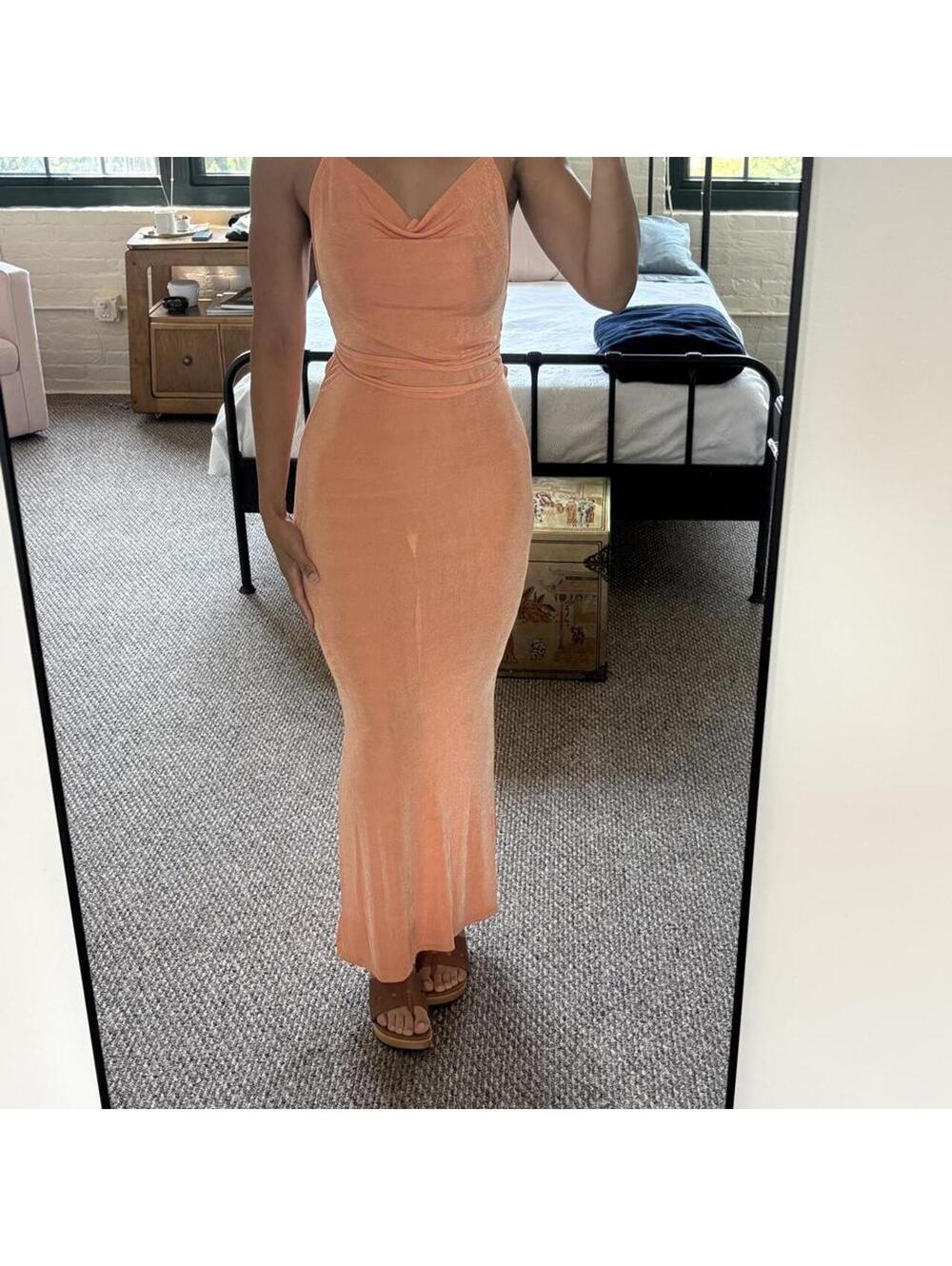 Orange maxi dress with tie back detail. Size: M/L…stretchy fabric